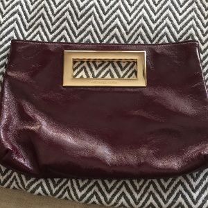 Michael Kors patented clutch
